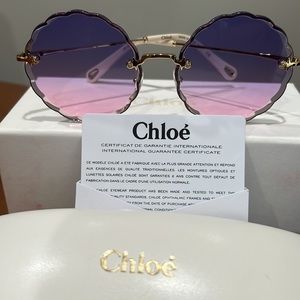 Authentic Chloe Rosie Sunglasses. Style CE142s color 861 Violet Fuschia.